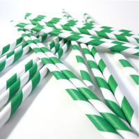 several green and white striped paper straws