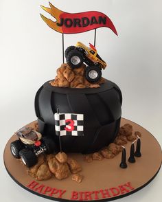 a birthday cake made to look like a monster truck