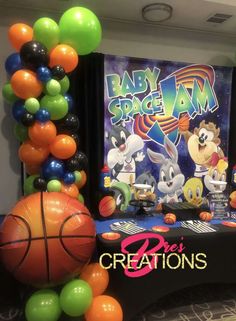 an image of baby space jam birthday party decorations