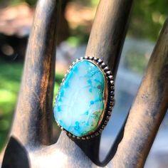 This Is A Gorgeous Piece Of Agate That Has Been Dyed Blue Around Its Edges And Set In 925 Sterling Silver. This Is An Older Original Piece Made In 2015 When I Was Learning To Fashion Rings Out Of Raw Materials. Please Ask Questions And Make An Offer. I Can't Say Yes If You Don't Ask! Unique Turquoise Larimar Gemstone Ring, Unique Turquoise Larimar Ring, Bohemian Sterling Silver Opal Ring With Natural Stones, Bohemian Opal Ring With Natural Stones In Sterling Silver, Turquoise Chalcedony Gemstone Rings, Blue Rings With Large Stone For Healing, Turquoise Chalcedony Ring Jewelry, Turquoise Agate Jewelry With Large Stone, Bohemian Agate Ring With Large Stone