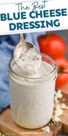 the best blue cheese dressing in a jar with a spoon