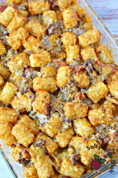 a casserole dish filled with tater tots