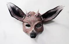 "Handcrafted mask of a deer, created by American artist/sculptor. Carolyn Watson Dubisch. Made of paper mache and paper clay this mask is very lightweight and is perfect for wearing or hanging as a decoration. Most masks are not ready to ship. Generally I take 4-6 days to sculpt, paint and finish the mask order. Please add the date of your show, event, photo shoot, etc. in the \"note to seller\" section when you purchase All masks can be made in an adult or child size. Masks come with black sati Mask Forest, Deer Mask, Paper Mache Mask, Paper Mache Animals, Mask Aesthetic, Animal Mask, Bird Masks, Half Mask, Forest Creatures