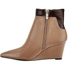 HALSTON Stunning Size-7.5 M New, two-tone Kimberly ankle boots from H by Halston. This sleek style has a trend-forward pointed toe, two-tone leather accents, and a wedge heel. Zipper closure. Style: Kimberly Pointed toe, full exterior zipper Approximate measurements: Wedge heel 2-3/4"H; Shaft 5"H; Ankle circumference 10" Fit: true to size Leather upper; man-made balance Booties Shoes, Tan Wedges, Sleek Style, Leather Accents, Shoes Leather, Sleek Fashion, Shoes Booties, Brown Boots, Tan Brown