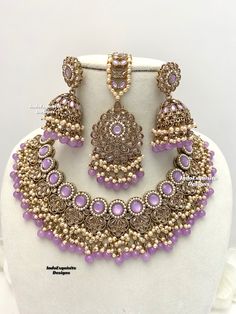 Antique Gold Polki Necklace Set comes with Jhumki earrings and tikka / Indian Jewelry/ High Quality Kundan and Polki Jewelry/ Bollywood Jewelry/Wedding Jewelry/lavender/lilac/light purple    All items are shipped from Brampton, Ontario, Canada. If you need your item by a certain day, please reach out to us for express delivery option before placing the order so that we can update the shipping for you. Standard shipping/delivery timeline Below are the delivery timeline estimates once the order ia Purple Indian Jewelry Set, Purple Stone Work Jewelry For Wedding, Elegant Purple Jewelry For Diwali, Purple Kundan Bollywood Jewelry, Purple Kundan Jewelry For Diwali, Festive Purple Kundan Jewelry, Festive Purple Kundan Necklace, Traditional Purple Necklace For Festive Occasions, Festive Purple Jewelry With Stone Work