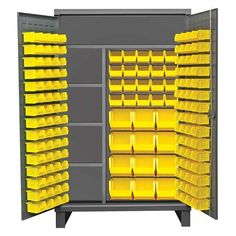 yellow plastic bins are stacked on the back of a storage cabinet with shelves full of them