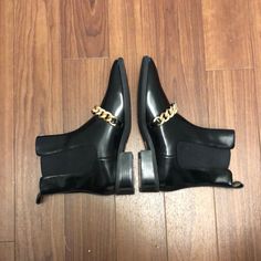 Edgy Chelsea Boots With Chunky Chain-Link And Glossy Surface. 1.5” Heel, Pull-On Style With Elastic Gore Insets. Upper Leather And Lining, Synthetic Sole. Size 8. Add Any 3 Or More Items From My Closet Into A Bundle And You’ll Receive An Automatic 25% Off. I Have Lots Of New With Tags Items. Happy Shopping! Elegant Formal Boots With Chain Detail, Elegant Formal Boots With Chain, Elegant Formal Boots With Chain Strap, Formal Boots With Chain And Round Toe, Leather Boots With Chain For Fall, Trendy Leather Boots With Chain Strap, Leather Boots With Chain Strap And Round Toe, Black Boots With Chain Strap For Formal Occasions, Formal Black Boots With Chain Detail