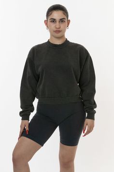 Made from a luxurious 14oz fleece, our cropped pullover is meticulously designed to flatter your curves and accentuate your waist. The cropped silhouette hits just above the belly button, highlighting your mid-section and creating a balanced look. The sleeves are slightly dropped and the neckline is higher for a relaxed yet modern look. Whether you're dressing up for a night out or dressing down for a casual day, our cropped sweater is the perfect addition to your wardrobe. This pullover is Garment Dyed. Our garment-dyed mock neck pullovers are dyed after they're sewn, which gives them a more durable and even color, including in the stitching and ribbing. This also means they'll have less shrinkage and colors will stay true after repeated washings. Features:  Made from our premium 14oz hea Lace Knitwear, Denim Short Jumpsuit, Los Angeles Apparel, South Central, Workwear Jacket, Leather Denim, Cropped Sweatshirt, Sleeveless Vest, Active Wear Leggings