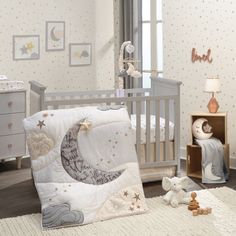 a baby's room with a crib, dresser and teddy bear on the floor