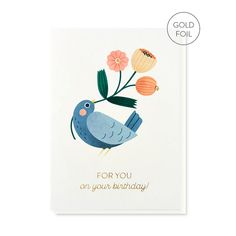 a card with a blue bird and flowers on it's back, says for you on your birthday