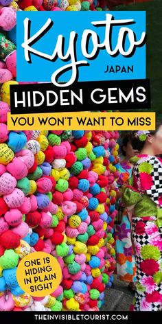 a woman standing in front of a pile of colorful balls with the words kyoto japan hidden gems you won't want to miss