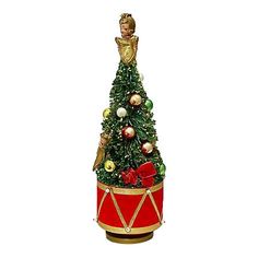 a small christmas tree in a red and gold container with ornaments on it's top