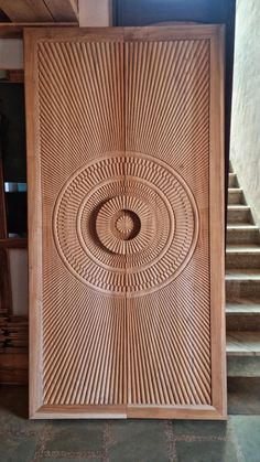 a wooden door with an intricate design on it