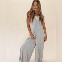 “Free To Flow” Jumpsuit. Jumpsuit Is Super Soft, Flowy And Comfortable. Gray Heather, Stretchy Fabric. Tied, Thin Adjustable Straps. V-Neck. Super Wide Leg. Side Pockets. Oversized Fit. Size S But Could Fit A Larger Size. Black Color/Style Picture Is Example Of Back View Of Jumpsuitreference Only. Jumpsuit Purchased From Grit & Gray Online Boutique. Nwt Only Jumpsuit, Back View, Color Style, Fashion Pictures, Stretchy Fabric, Oversized Fits, Online Boutique, Pant Jumpsuit, Black Color