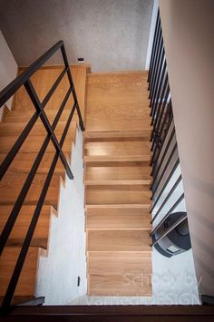 there is a wooden stair case in the house