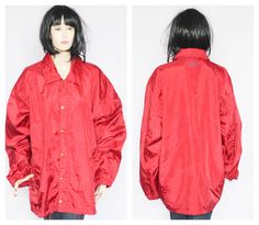 Lightweight red jacket Vintage windbreaker Breathable Sport jacket Autumn coat raincoat Sport wear Spring clothing Womens jacket 90s jacket Funky 90's vintage retro  sport jacket, in red colour. Lightweight  Size:  XL Measurements:  Length: 67cm (26.4in) Bust (armpit to armpit): 68cm (26.8in) Sleeve from shoulder : 63cm (24.8in)  Shoulder to shoulder: 59cm (23.2in) Condition: In good vintage condition, has small hole 2mm on sleeve Please refer photos for condition Cheap Sporty Red Outerwear, Luxury Red Long Sleeve Track Jacket, Bavarian Dress, Oktoberfest Dress, Black Fedora Hat, German Dress, Sports Jackets Women, Autumn Coat, Spring Clothing