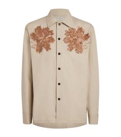 Buy from $1574.00: Where opulence meets heritage, Dries Van Noten boasts a generational knowledge of tailoring that imbues each piece with a refined sense of expertise. Deftly embroidered with a floral design, this shirt is an elite example. It adds a refined edge no matter if its worn with your favourite tailored trousers or open over a T-shirt. Designer Embellished Cotton Shirt, Designer Embroidered Shirt For Spring, Designer Embroidered Shirt For Work, Designer Embroidered Workwear Shirt, Luxury Embroidered Cotton Tops, Blow Dry Salon, Tailored Shirts, Leather Shops, Dries Van Noten