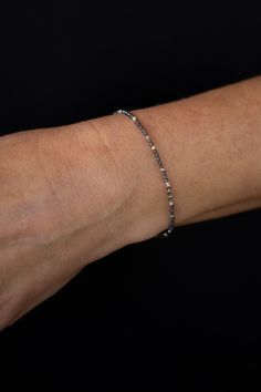 Add a touch of elegance to your wrist with our Light Smoky Quartz Silver Bracelet. This dainty, adjustable piece features natural stone beads with delicate silver accents. The small stones add a touch of sophistication, making this bracelet a gorgeous addition to any outfit. Emotional Body, Natural Stone Beads, Silver Accents, Smoky Quartz, Metal Rings, Clear Quartz, Spring Rings, Stone Beads, Natural Stone