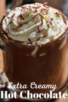 there is a hot chocolate drink with whipped cream on top