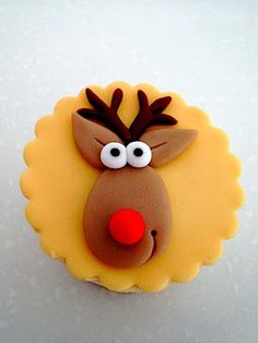 a cupcake decorated to look like a reindeer