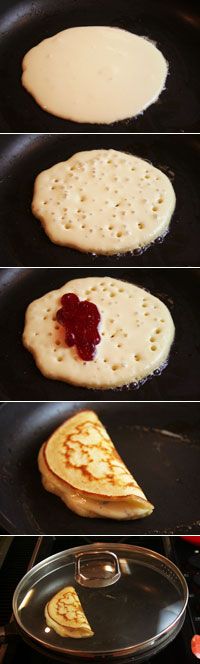 pancakes being cooked in a pan with jam on them and then put to the oven