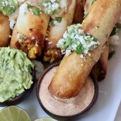 mexican food with guacamole, tortilla and salsa on the side