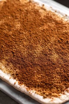 a baking pan filled with spices on top of a counter