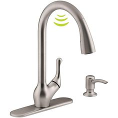 a faucet with thermostaer attached to it, and an appliance