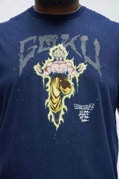 the back of a man's blue shirt with an image of gohan on it