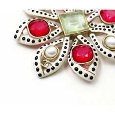 This is part of Chairish’s Costume Jewelry assortment.  Chanel Rare White Black Polka Dot Red Gem Pearl Large Brooch  *Marked 16 *Made in France *Comes with the original box  - It is approximately 2.75' x2.75". - Very pretty and artsy  - In a pristine condition Luxury White Brooch For Gift, Luxury Red Brooches For Formal Occasions, Luxury White Brooches For Gifts, Luxury White Brooches As Gift, Luxury Multicolor Brooches For Gifts, Luxury Multicolor Brooches As Gift, Elegant Red Brooches Collectible, Designer White Brooches For Formal Occasions, Chanel White