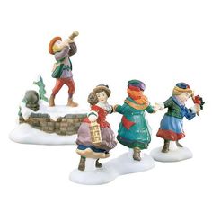 figurines of children playing in the snow