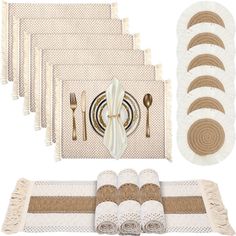 a table setting with place mats, napkins and silverware