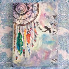 a painting with feathers on it and birds flying in the sky next to an image of a dream catcher