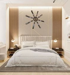 a large white bed sitting in a bedroom on top of a hard wood floor