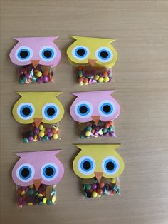 four owls made out of candy on top of a table