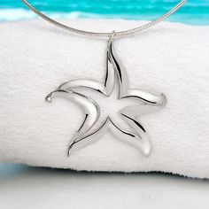 🌎 Celebrate ocean conservation and share the love for these incredible creatures. 📣 Let the ocean vibes resonate with your style! *Made In USA *Items Ships Within 24 Hours *Keepsake Gift Box Included *110% price match guarantee.  *Guarantee/Warranty 12 Months Defective Item Replacement Policy *STARFISH GIFTS FOR SEASTAR LOVERS - According to legend, starfish are reflections of stars in the sky inhabiting the ocean floor. The star as well as the starfish are seen as celestial symbols. Artist Roland St John's hand-crafted design is an original and unique Sea Star gift. This beautifully contemporary style makes this great for everyday wear. This is an incredibly special gift idea starfish lovers. Look no further, you have found the sea life gift for any occasion *PRIDE IN OUR PRODUCTS- This Beach Jewelry With Sterling Silver Star, Beach Jewelry In Sterling Silver With Star Shape, Celestial Symbols, Beachy Necklace, Starfish Jewelry, Stars In The Sky, Ocean Floor, Nickel Free Jewelry, Starfish Necklace