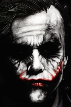 the dark knight joker with his face painted white and red