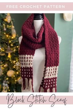 a crocheted scarf on top of a mannequin next to a christmas tree