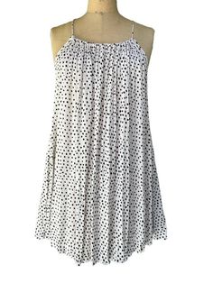 "Billabong Women's White Polka Dot Mini Dress M Size Medium Spaghetti Straps Racerback  A-line Silhouette Gauzy Lightweight  Adjustable Straps Measurements Chest 39\" Waist 48\" Hips 54\" Length 30.5\"" Polka Dot A-line Mini Dress For Summer, Polka Dot Sleeveless Mini Dress For Beach, Sleeveless Polka Dot Mini Dress For Beach, Polka Dot Mini Dress For Beach In Summer, Sleeveless Polka Dot Mini Dress For Vacation, Polka Dot Mini Sundress For Summer, Polka Dot Mini Dress For Beach And Summer, Casual Polka Dot Sundress For Summer, Polka Dot Spaghetti Strap Vacation Dress