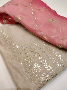 Item Overview Atharva Hand Embroidered Salwar Kameez w/Embroidery Neck in Beige/Dual shade Gota Patti work Dupatta/Custom Stitched/Bridal Trousseau/CH1219 Fabric: * Shirt Chanderi - 2.5 Mts Hand Embroidered Neck * Dupatta:Chiffon Chinnon Dupatta w/Gota Patti Work in 2.5 Mts Dual Shade * Bottom Santoon Silk 2.5 Mts. Excusive Hand Embroidered Party Wear Punjabi Suit. Customization: * Fabrics Customization: Designs Can be made in any Fabric of choice. * Color Customization: Design can be made in an Designer Unstitched Suit With Gota Work For Diwali, Festive Unstitched Suit With Gota Work And Kundan, Diwali Chanderi Salwar Kameez With Resham Embroidery, Dola Silk Traditional Wear With Mirror Work For Eid, Eid Traditional Wear With Mirror Work In Tissue Silk, Eid Traditional Wear With Mirror Work And Dola Silk, Eid Traditional Tissue Silk Wear With Mirror Work, Eid Tissue Silk Traditional Wear With Mirror Work, Festive Unstitched Salwar Kameez With Mirror Work