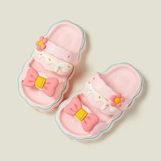 Introducing our delightful Cake Kids Slides, the perfect combination of comfort, convenience, and cuteness for your little girls. These slides are designed to make every step a sweet and enjoyable experience, just like walking on a delicious cake! Featuring a charming design with cute flower accents, these slides are sure to capture the hearts of young girls. The ribbon details add an extra touch of charm, making them a stylish choice for any occasion. Our Cake Kids Slides prioritize comfort, en Cute Slide Sandals In Eva, Cute Eva Slide Sandals, Cute Slide Sandals With Eva Material, Cute Closed Toe Summer Slippers, Playful Non-slip Slip-on Slides, Cute Non-slip Flip Flops With Round Toe, Cute Non-slip Slide Flip Flops, Cute Slip-on Eva Sandals, Playful Non-slip Closed Toe Slippers