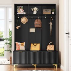 a black coat rack with purses, hats and handbags hanging on the wall