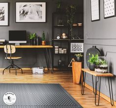 a home office with grey walls and wooden flooring is featured in the berger small spaces catalog