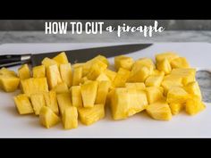 how to cut a pineapple on a cutting board with a knife and some pieces