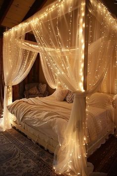 a bed with lights on it and a canopy over the headboard is lit up