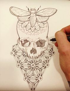 a drawing of a skull with a bee on it