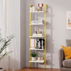 a living room filled with furniture and a tall yellow shelf next to a chair in front of a window