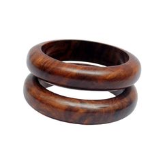 two wooden rings sitting on top of each other