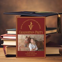 a graduation card with a photo of a woman and a horse on top of books