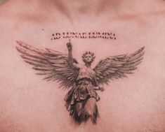 a man with a tattoo on his chest has an angel and the words adunte la culteria above it